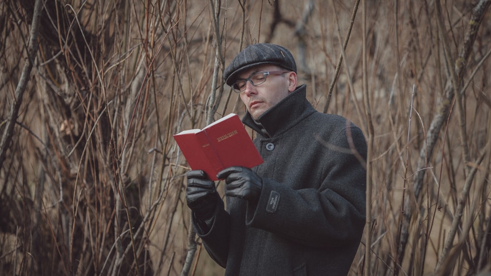 a man holding a book