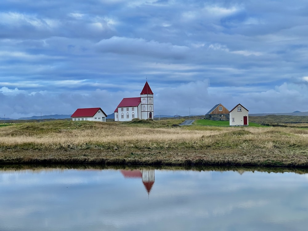 a group of buildings next to a body of water