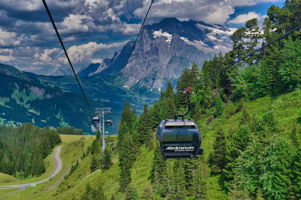 a cable car going up a mountain