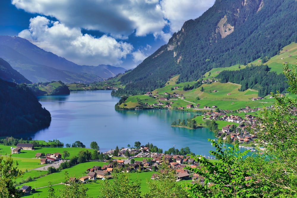 a lake surrounded by mountains and trees