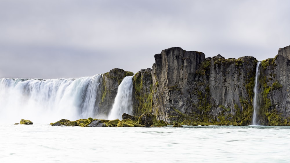 a waterfall over a cliff