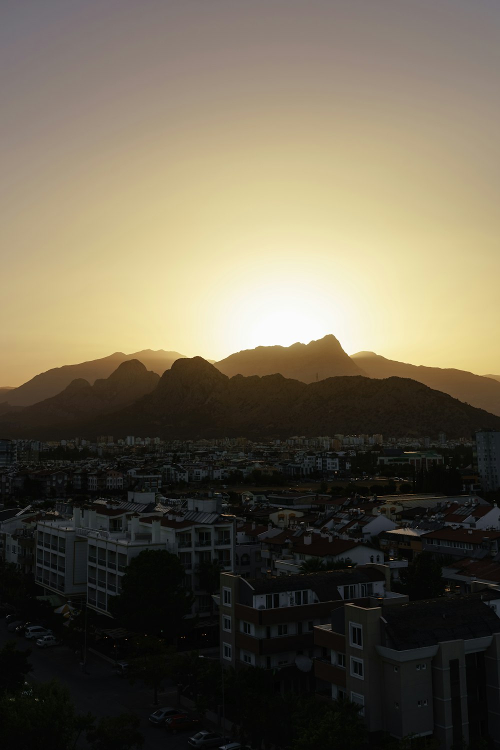 a city with a mountain in the background