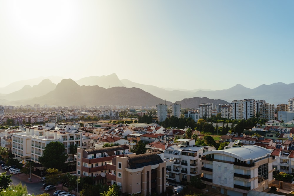 a city with mountains in the background