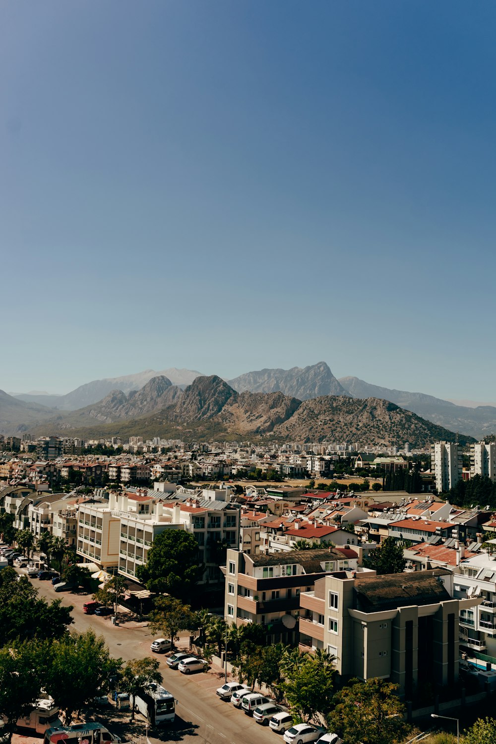 a city with a mountain in the background