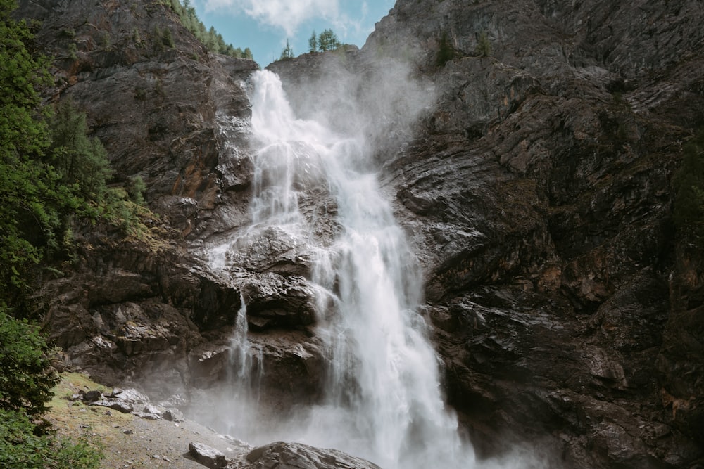 a waterfall in a rocky area