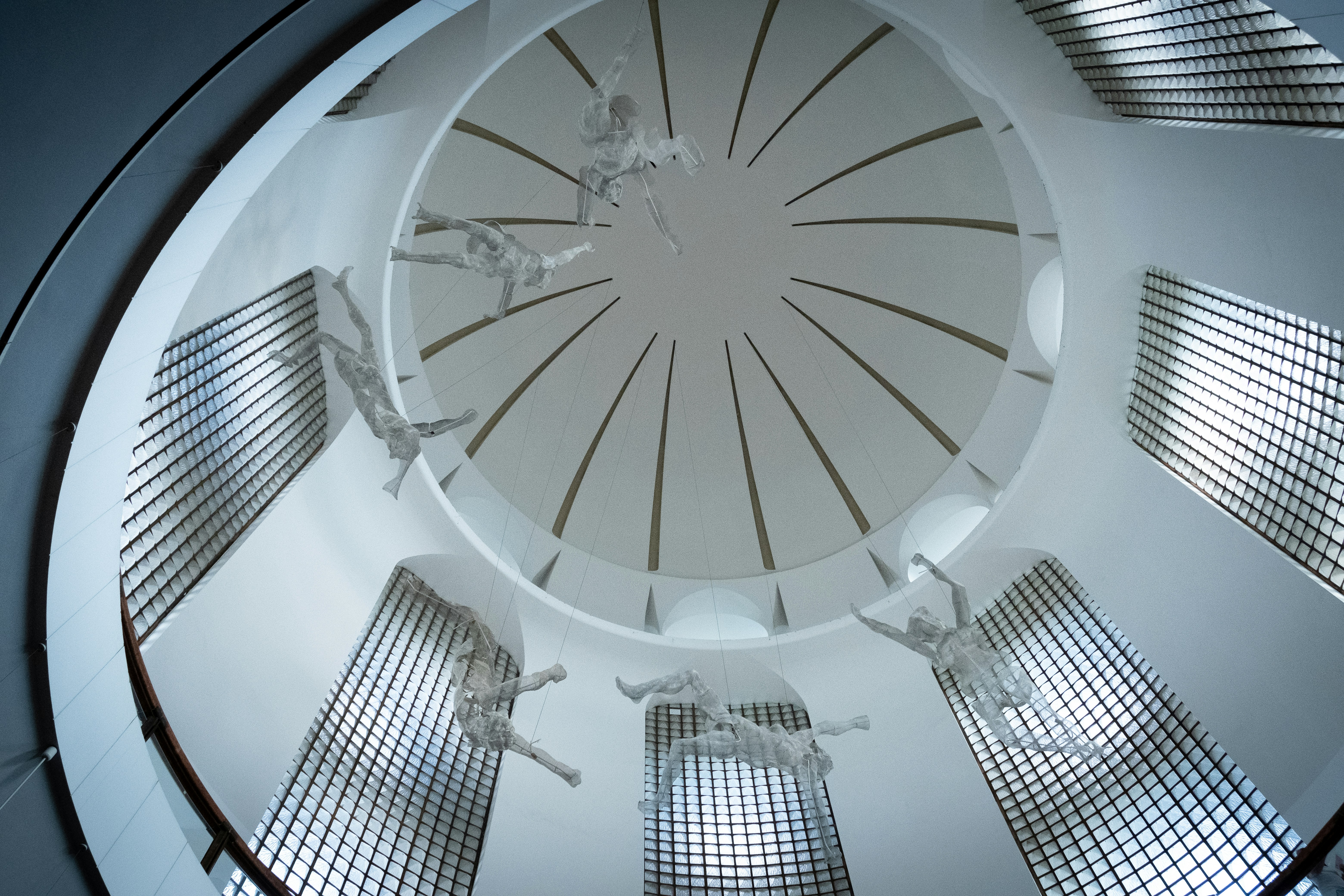 a ceiling with a fan
