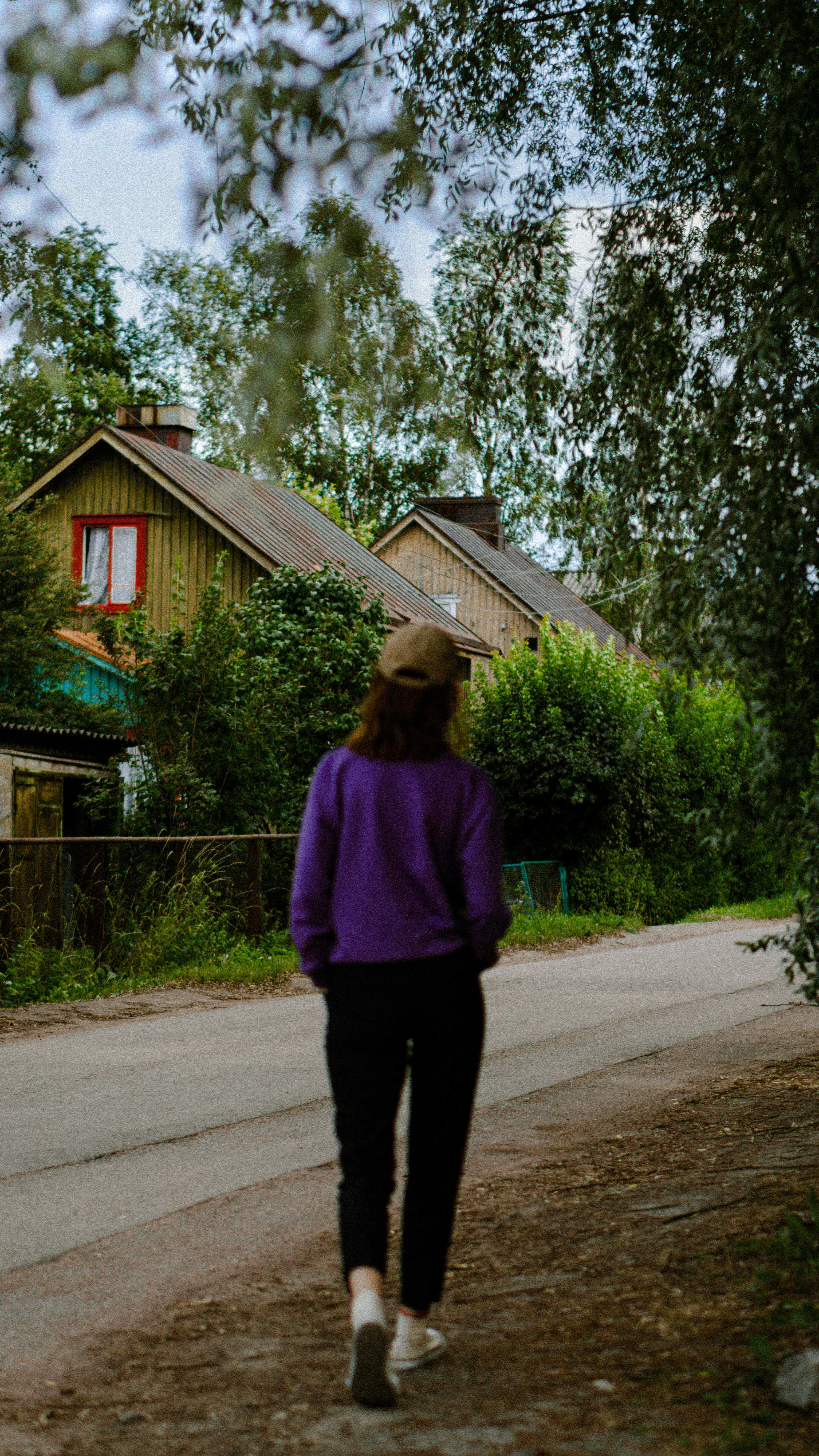 a man walking on a road