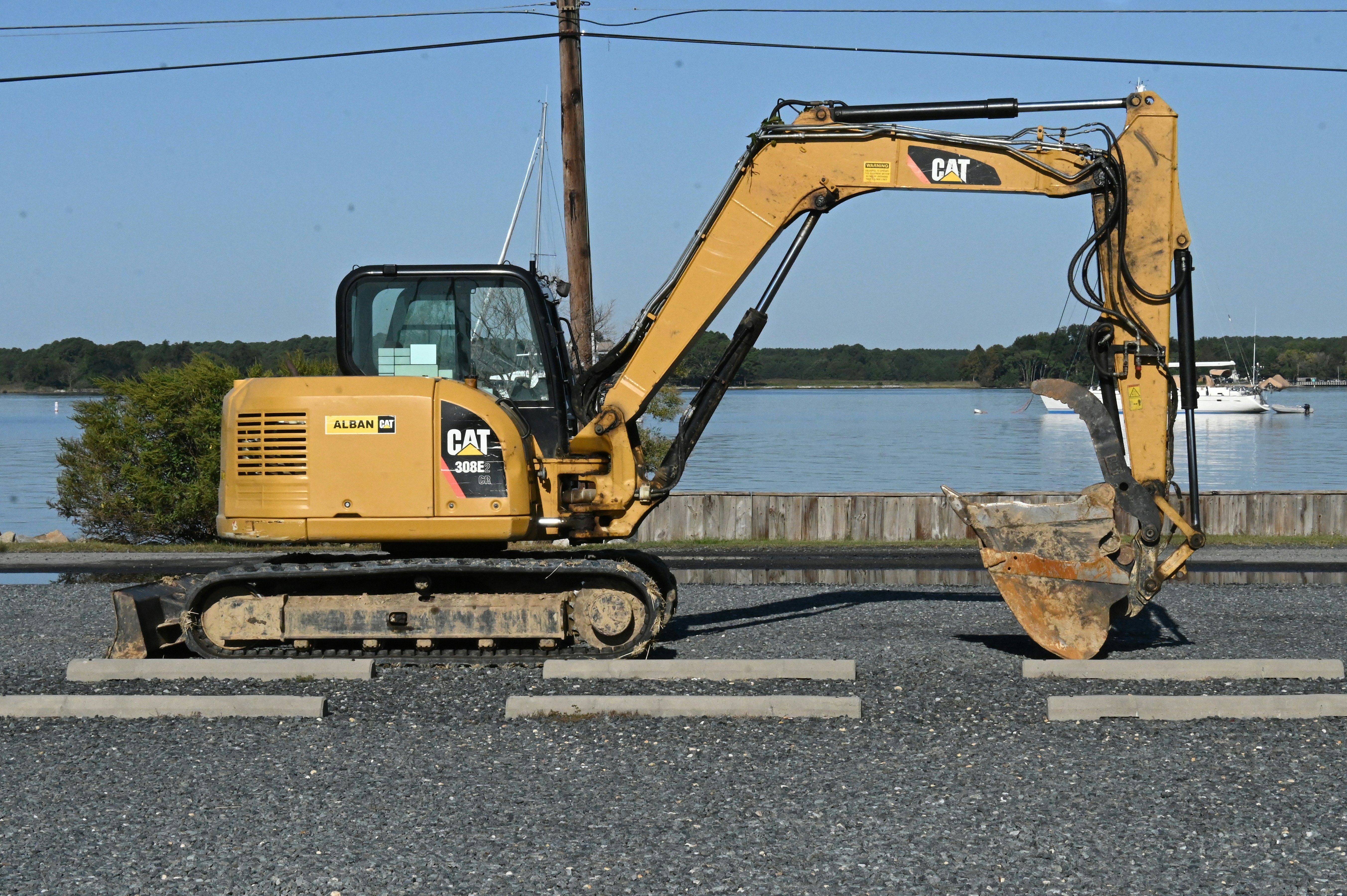 a yellow bulldozer on a dock