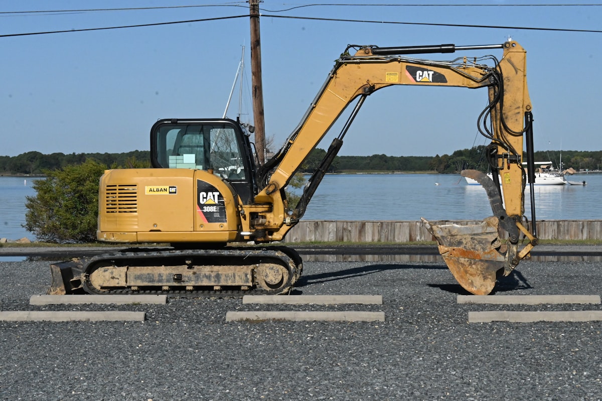 Heavy construction excavator operating on a large construction site
