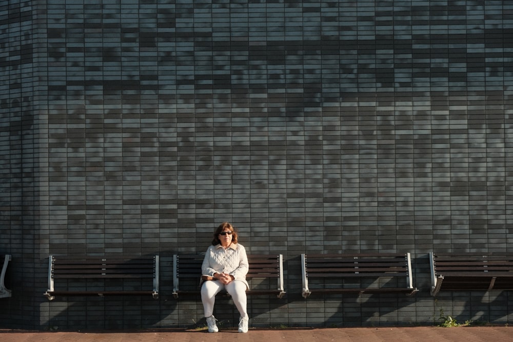 a man sitting on a bench