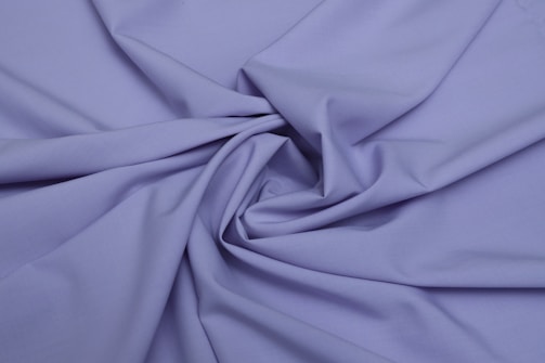 Delicate handcrafted art piece with lilac and lavender hues.