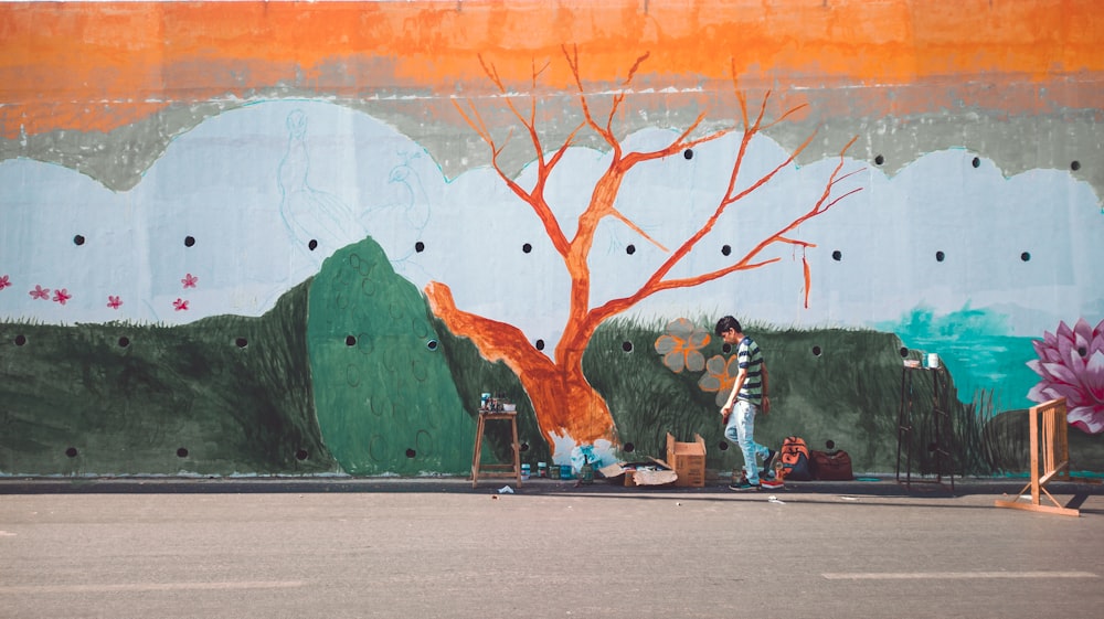 a person painting a wall