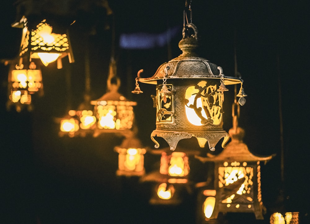 a group of lit up lanterns
