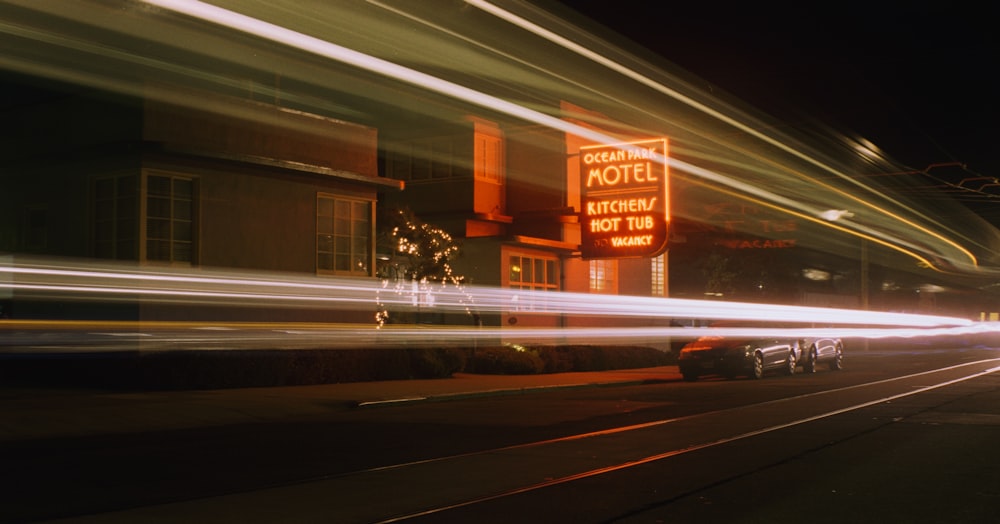 a street sign at night