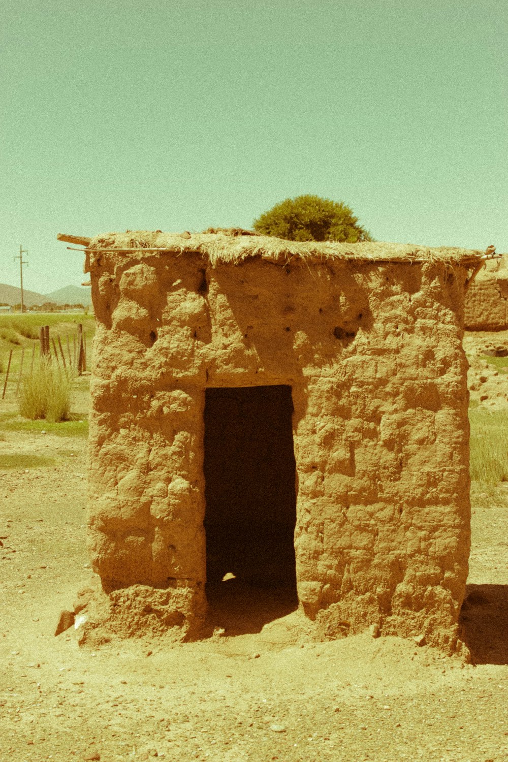 a stone building with a door