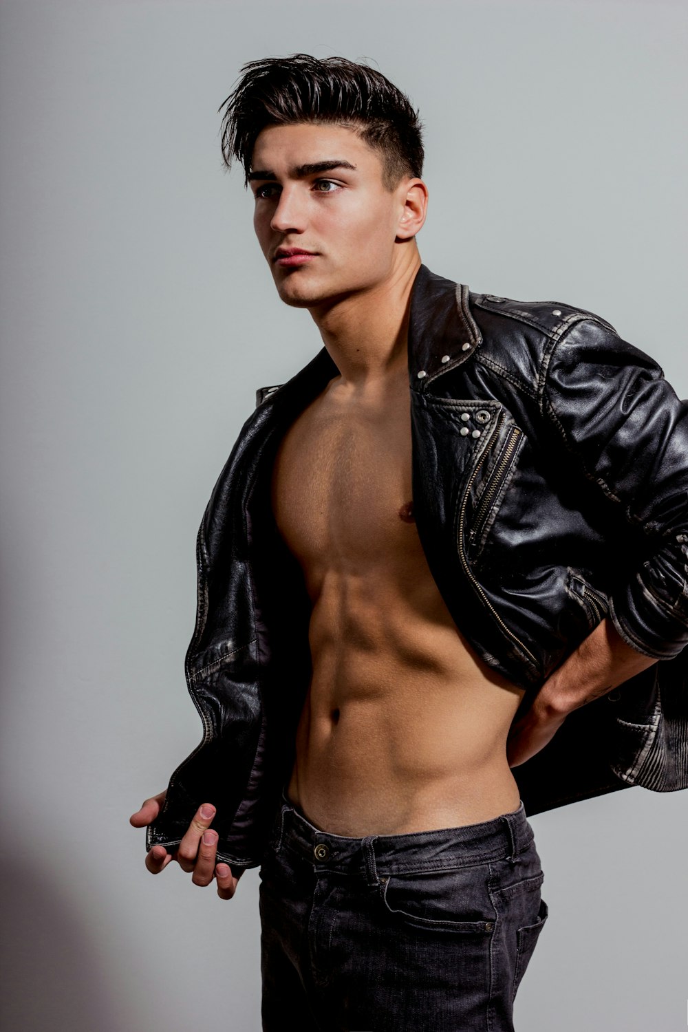 a man wearing a leather jacket