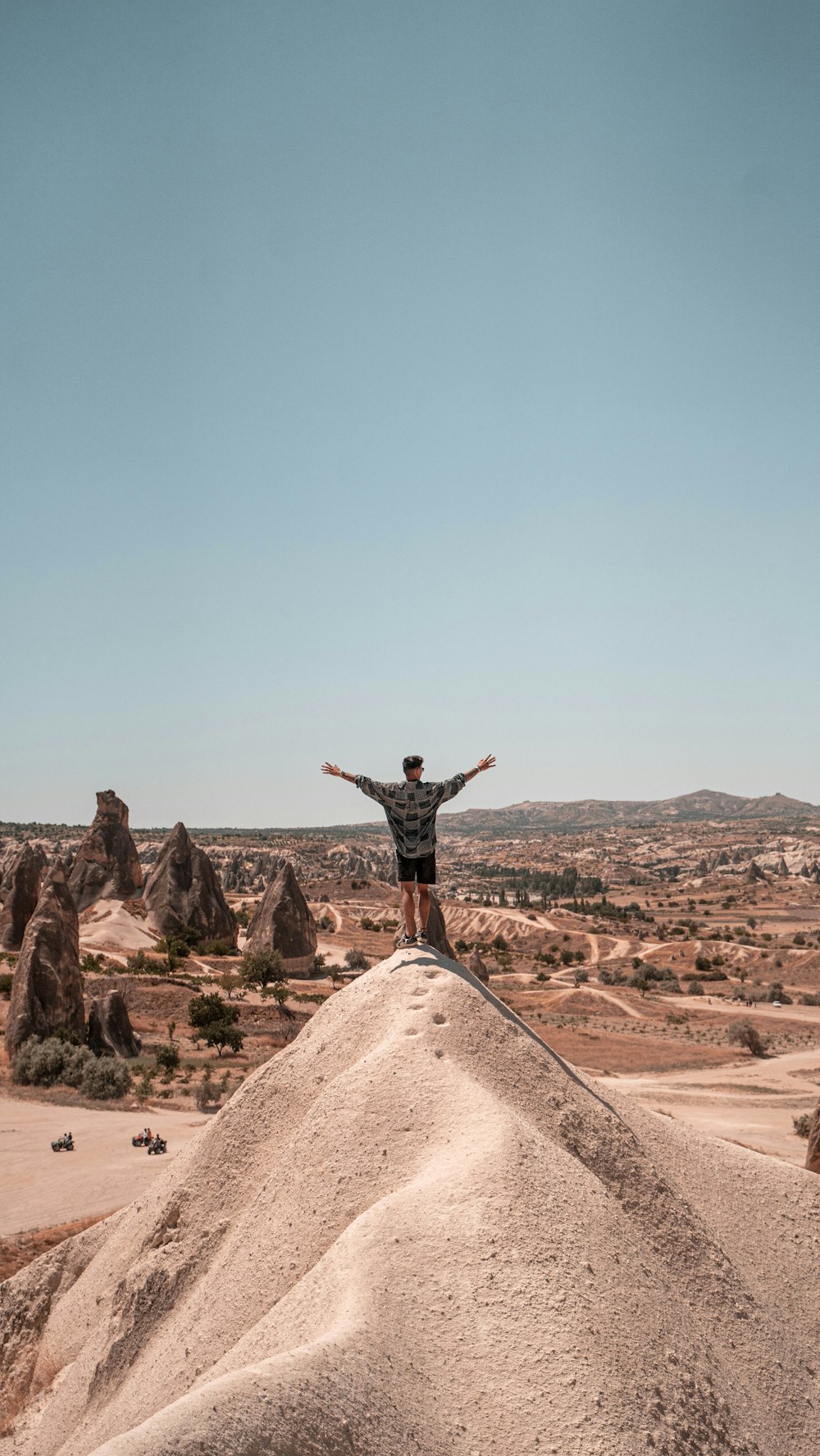 a man standing on a rock