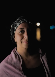 Portrait of Abdul Quadir Gaziani against a dark background with subtle glowing star effects.