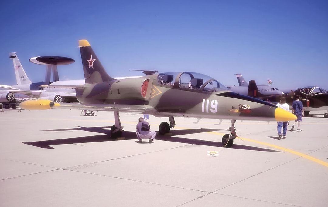 a group of jets on a runway, Russian MiG-17 Jet Trainer. Photo was made from scanned 35mm film.