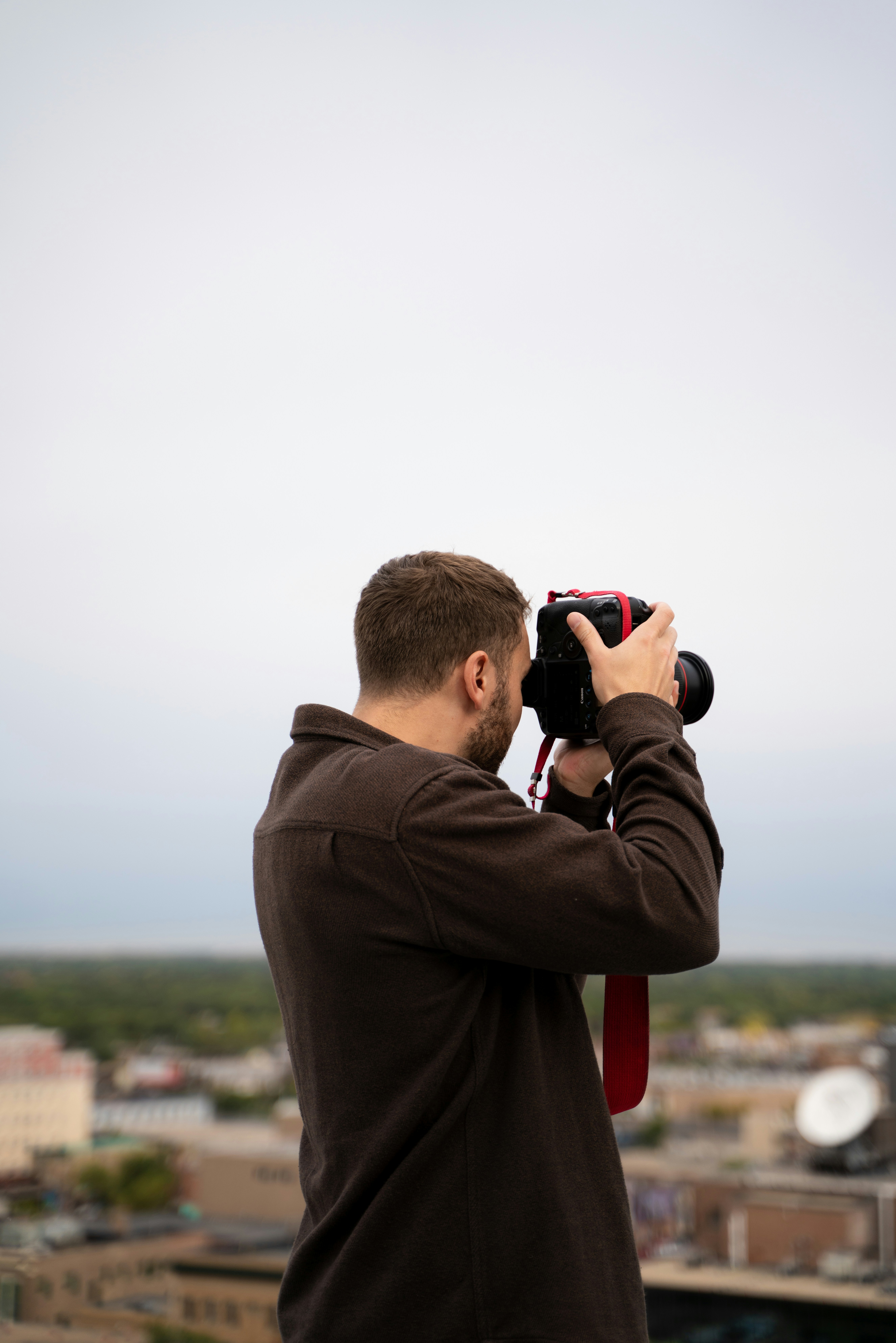 a man holding a camera