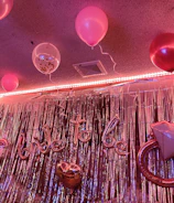 Elegant balloon garlands decorating a wedding reception.