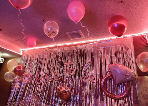 Elegant balloon garlands decorating a wedding reception.