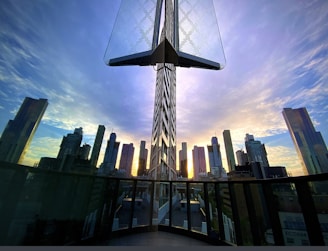 A view of a city skyline at sunset.