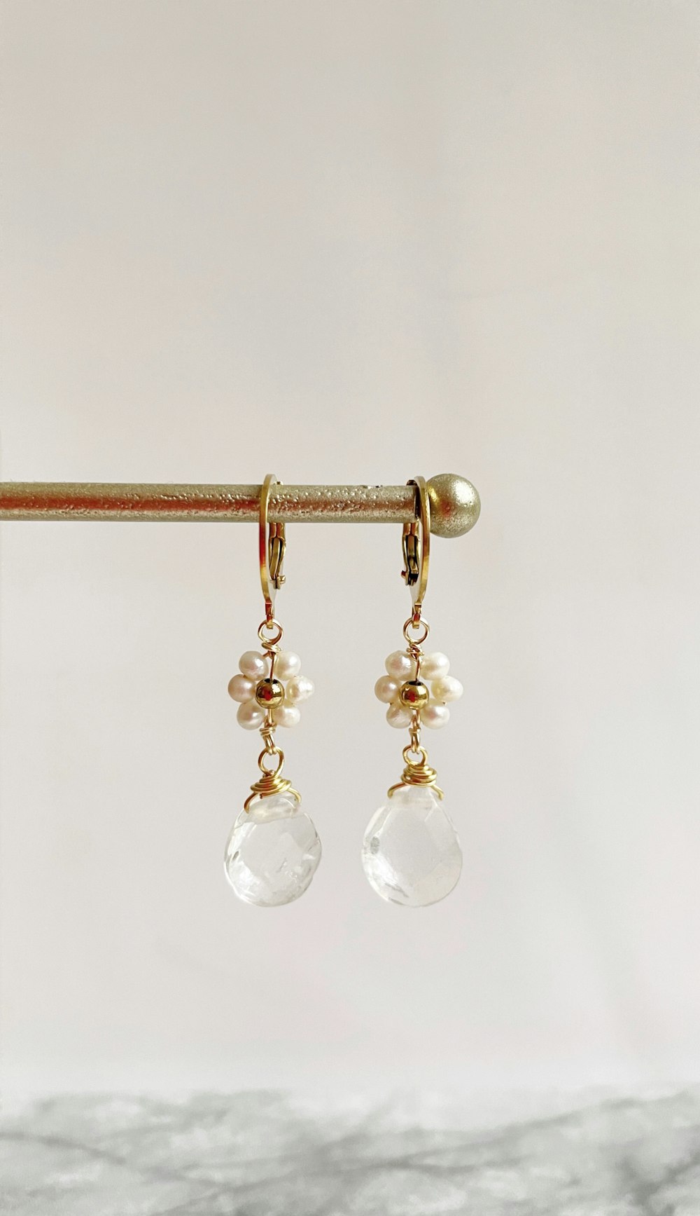 a pair of earrings on a string