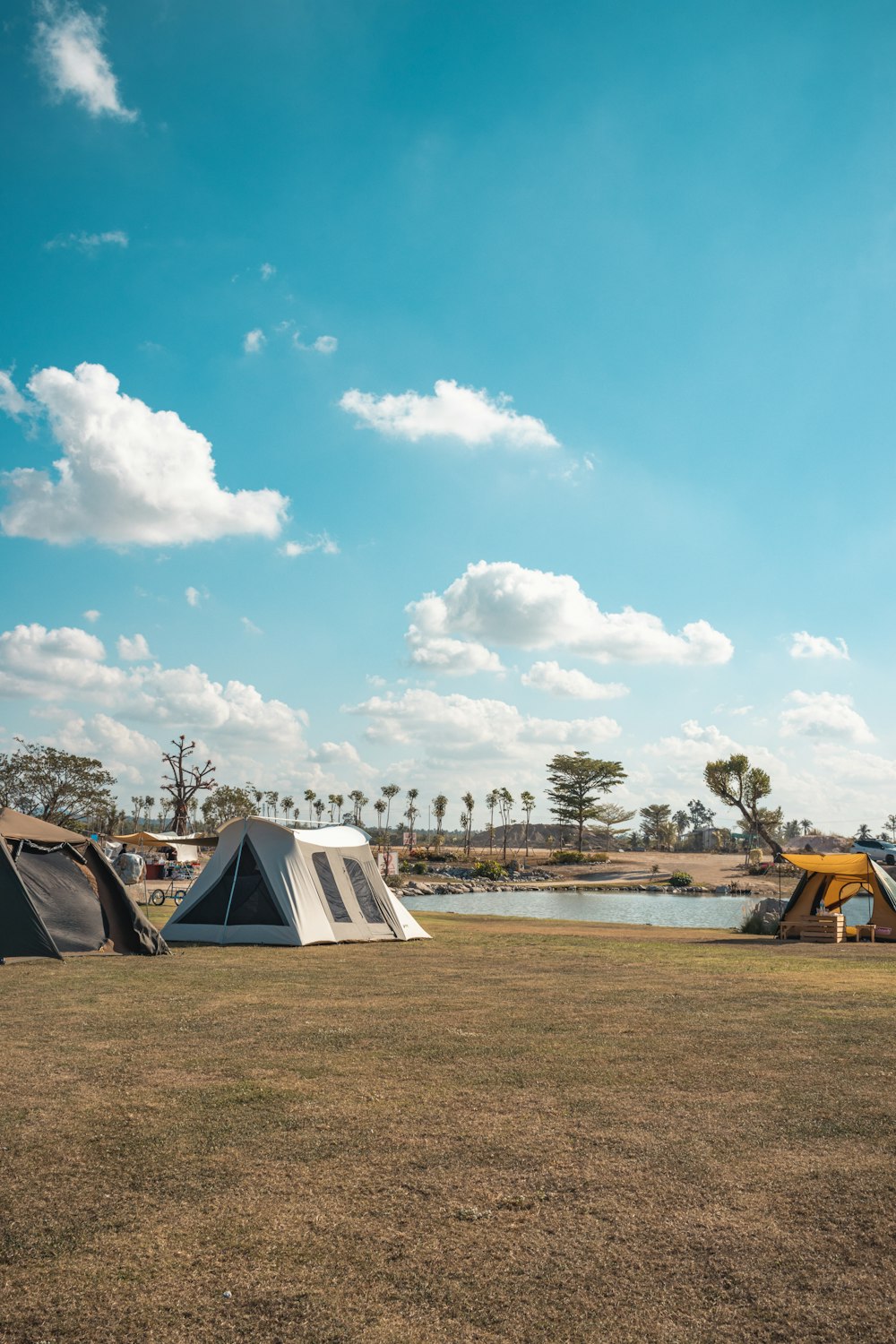 a group of tents on a field