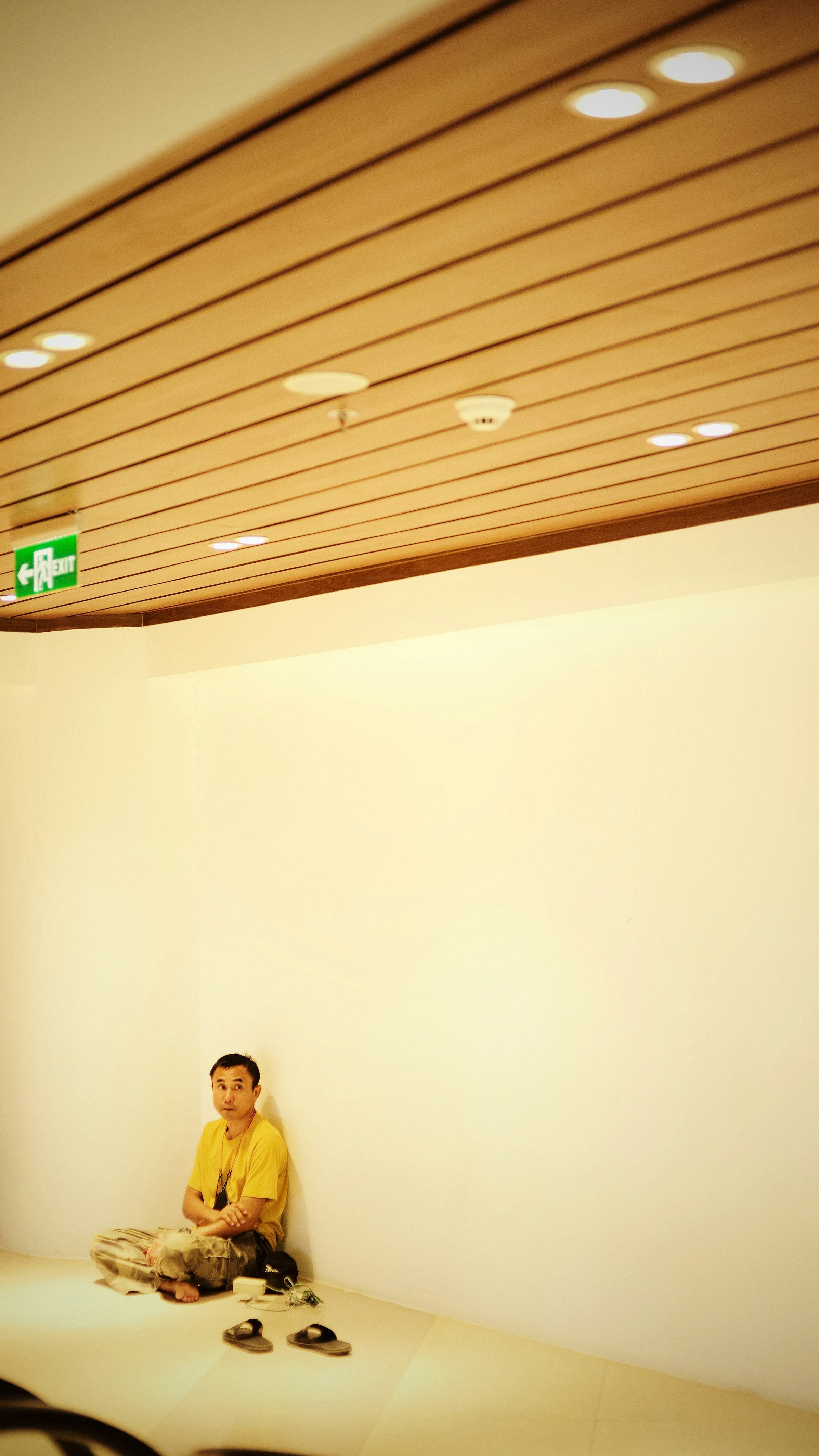 a person sitting on a bed