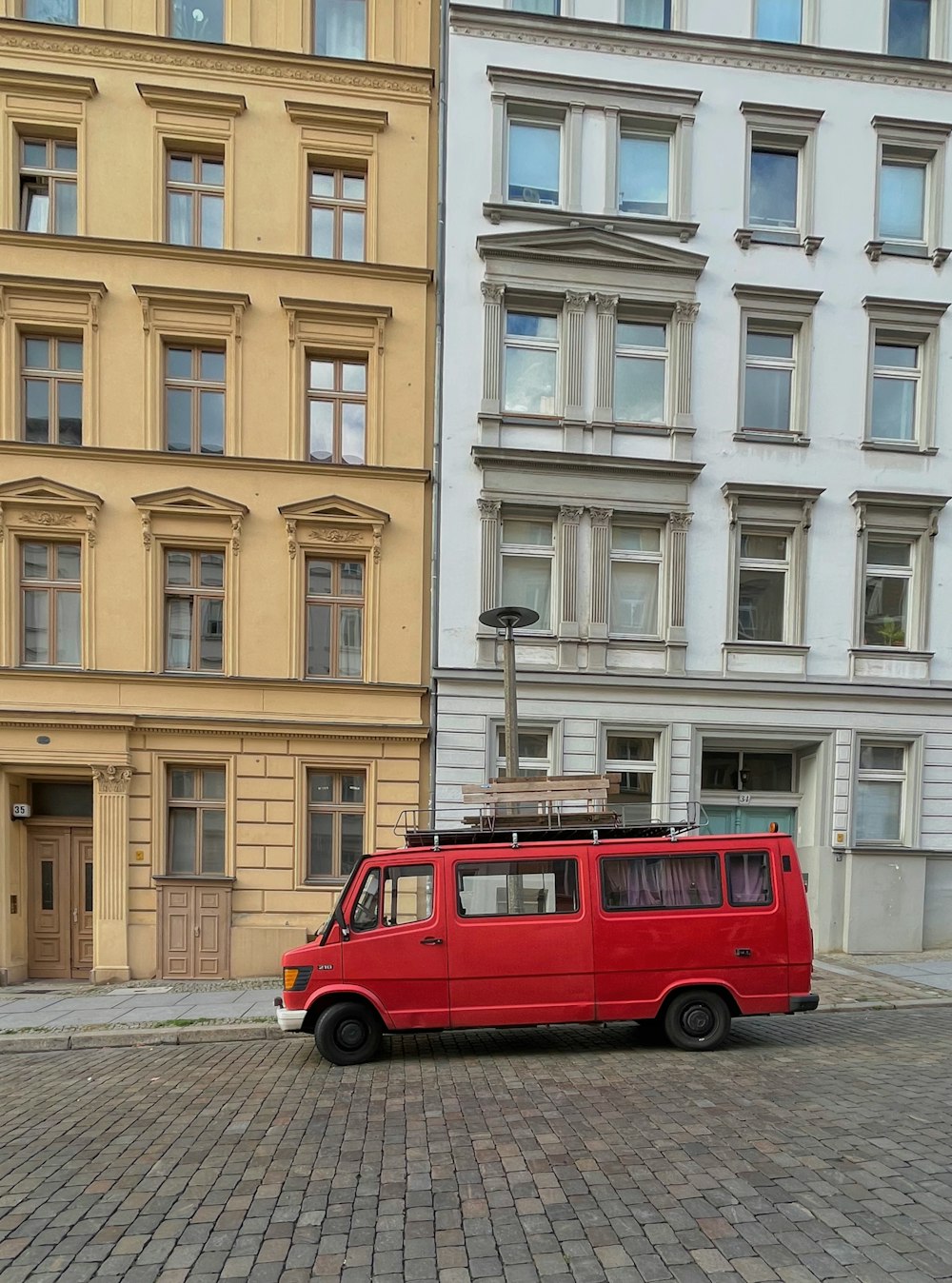 a truck is parked in front of a building