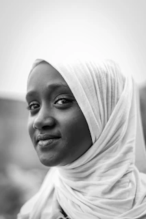 a man wearing a white head scarf