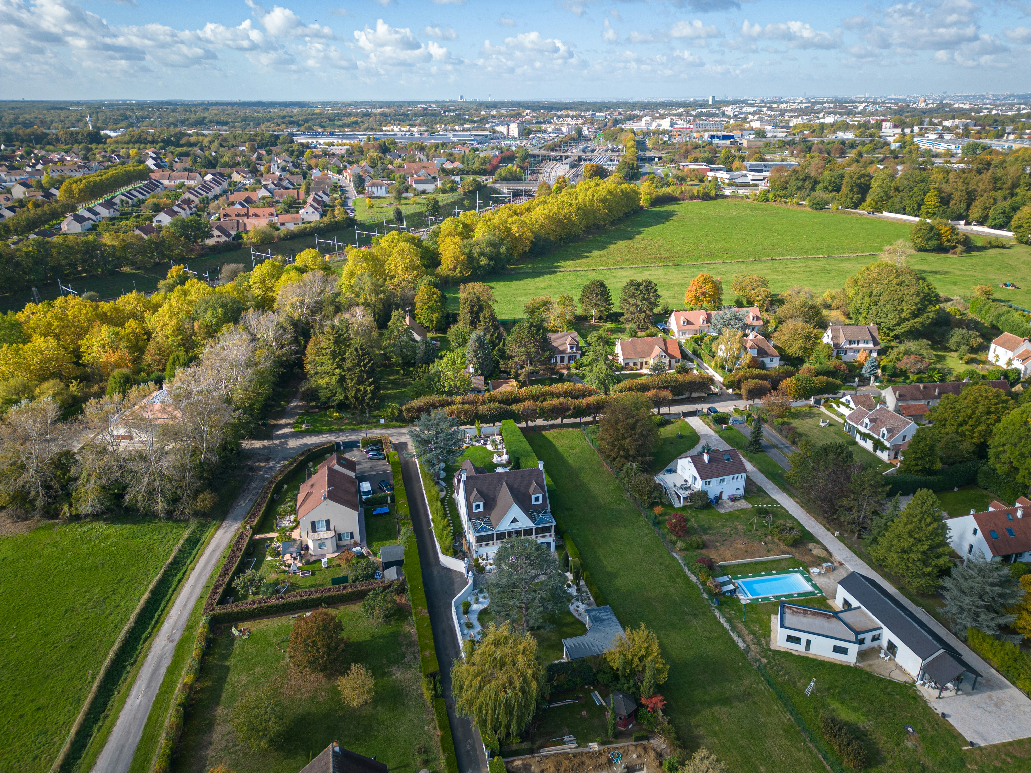 a landscape with houses and trees