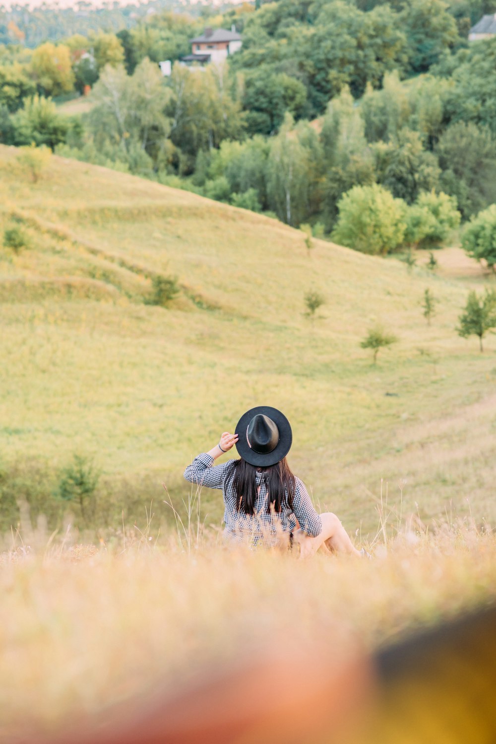 a person sitting in a field