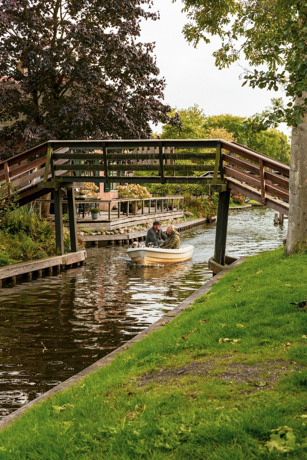 a couple of people in a boat on a river