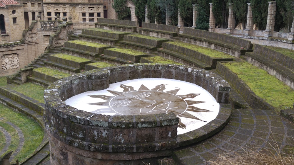 a stone monument with a symbol on it