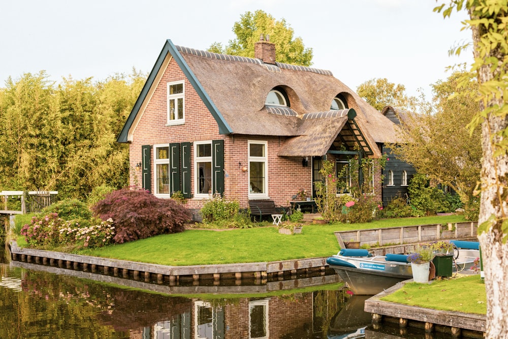 a house with a pond in the front