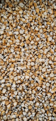 A vibrant display of premium maize cattle feed pellets.