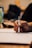 Close-up of hands holding a notebook and pen during a counseling session.
