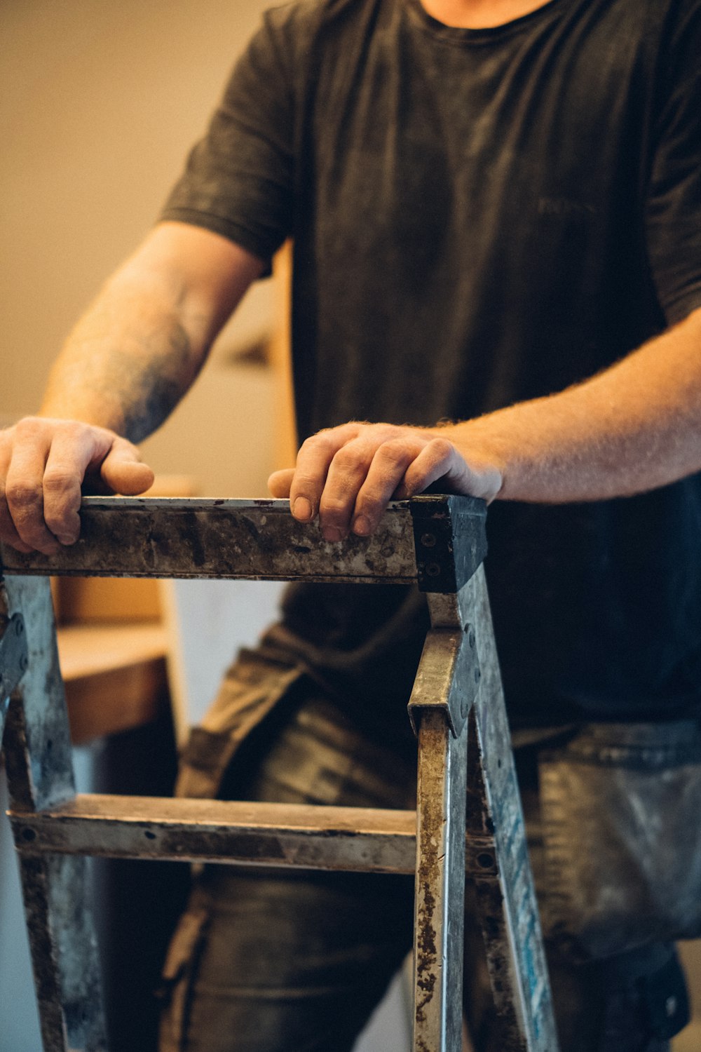 a man holding a metal bar