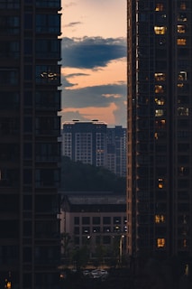 Night view of Godrej apartments illuminated against the Pune skyline.