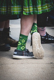 a pair of people wearing matching shoes