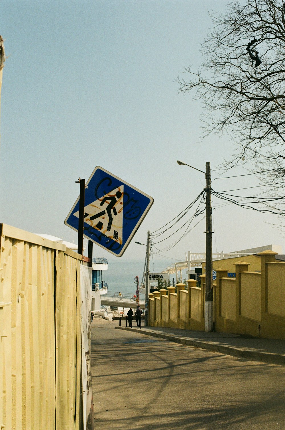 a sign on the side of the street