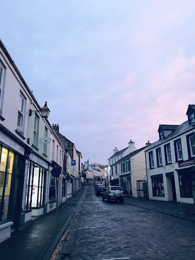 a street with cars parked on the side