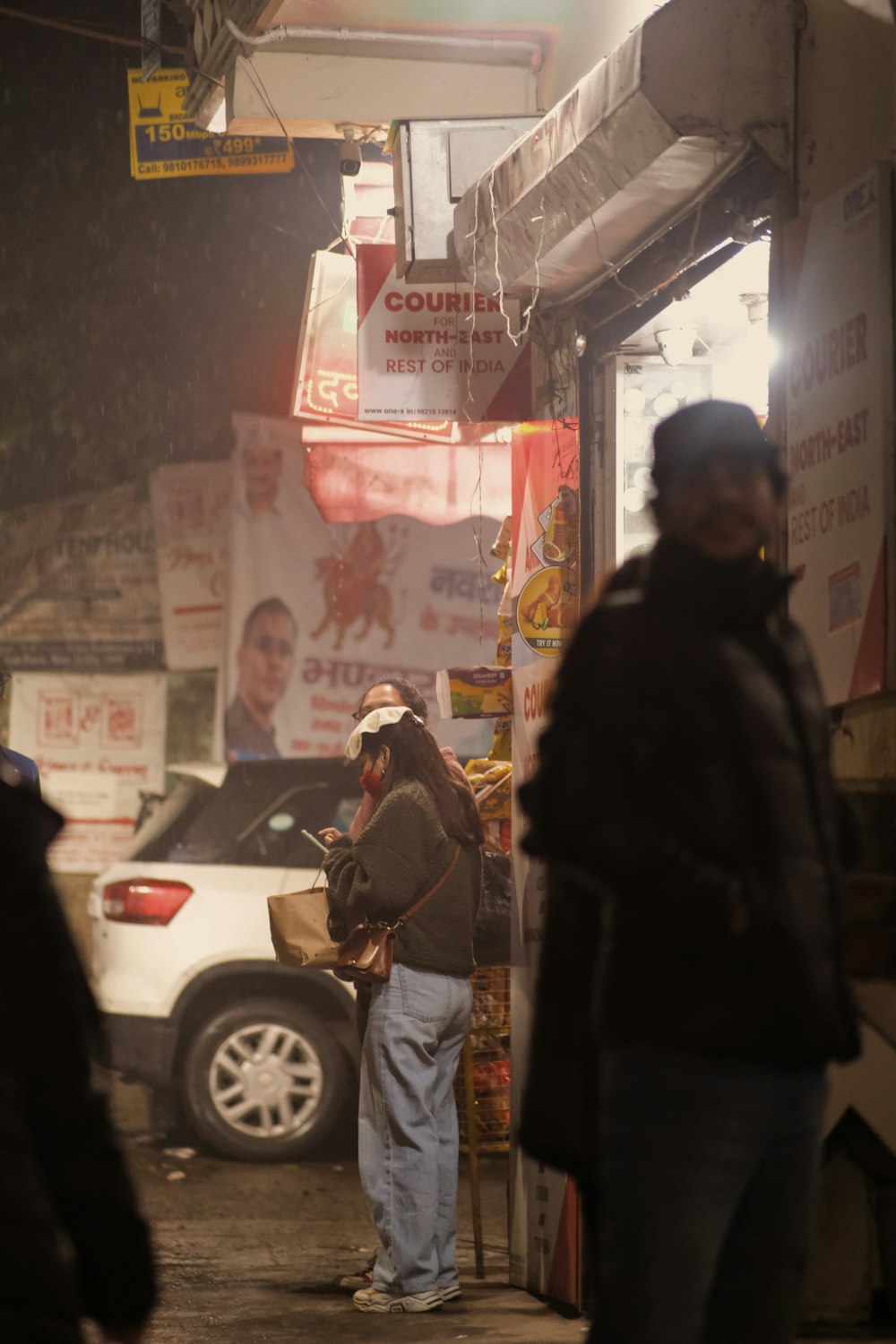 a person standing in front of a store