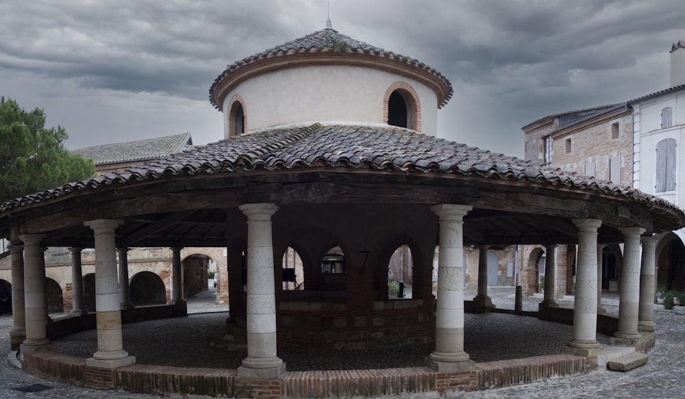 a building with pillars and a dome