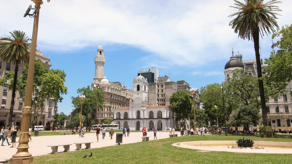 a large building with a dome and towers surrounded by trees