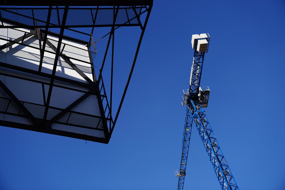 a crane lifting a building