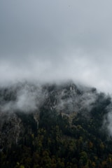 A fantasy landscape featuring floating islands and misty mountains.