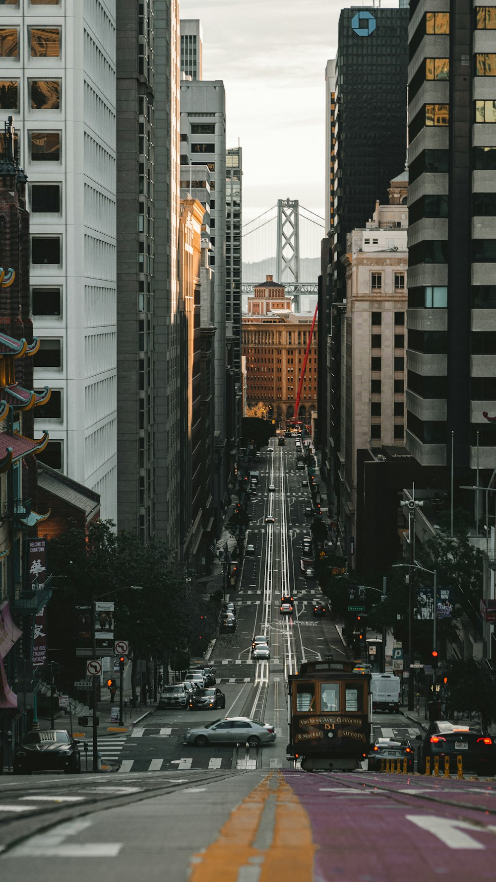 a city street with tall buildings